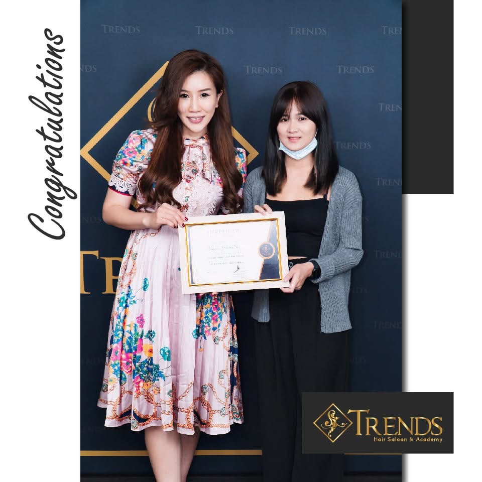 Wendy with a student celebrating hair extension training completion